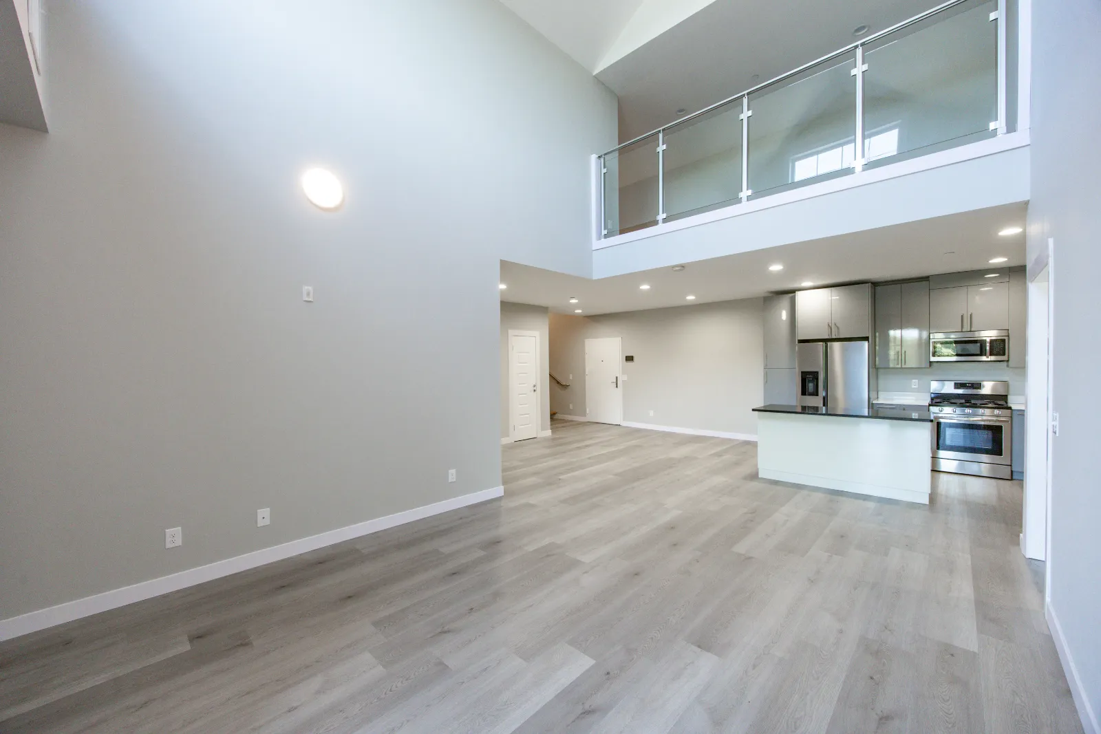 Two-level loft living room — Taj Estates of Franklin I